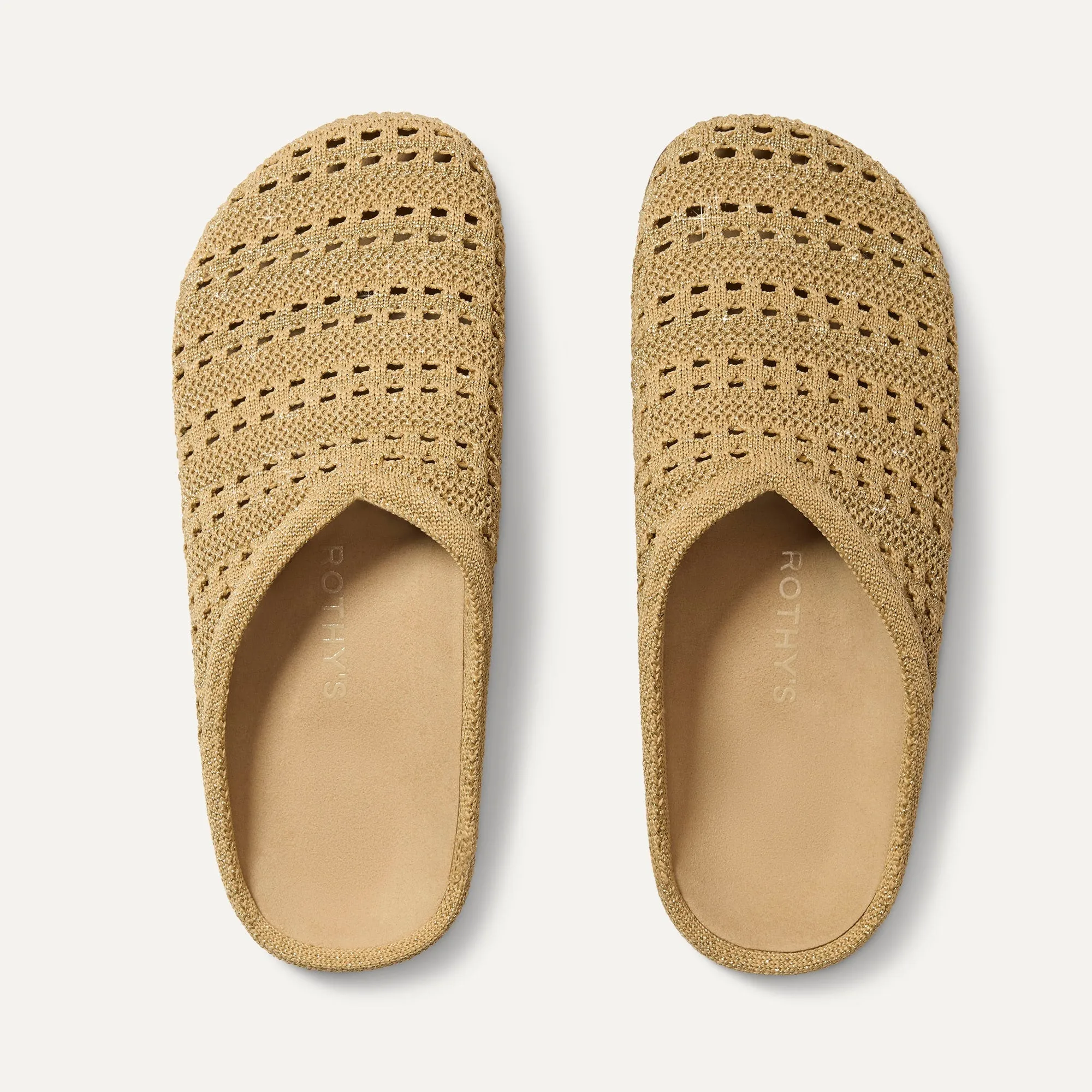 The Casual Clog - Metallic Golden Crochet sold by Rothy's