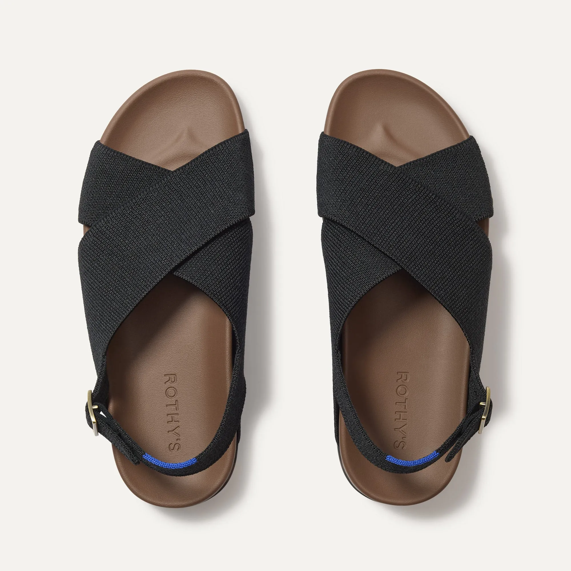 The Weekend Sandal - Black sold by Rothy's