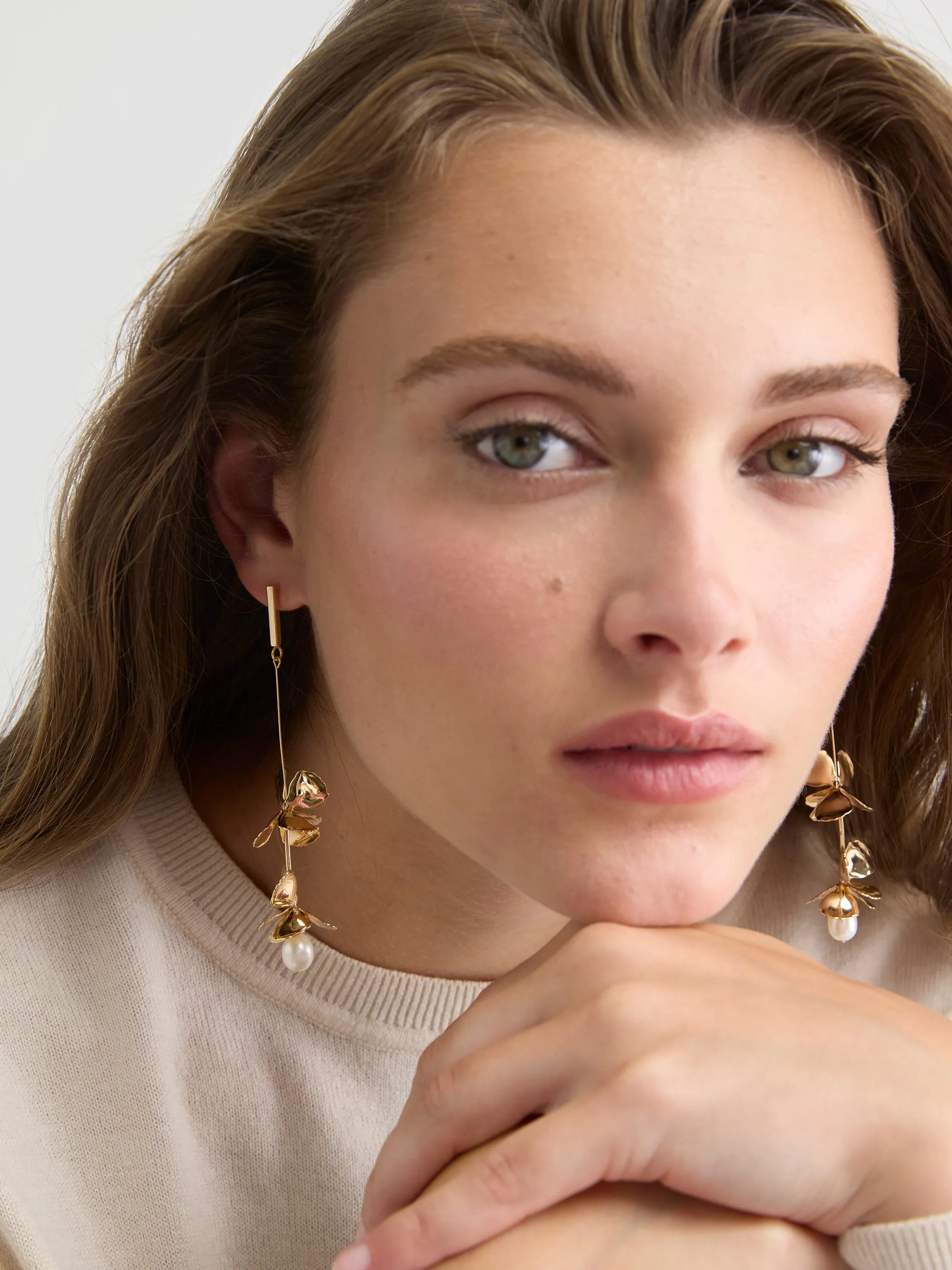 Golden Earrings with Flower Pendants with Pearls sold by RW&CO.