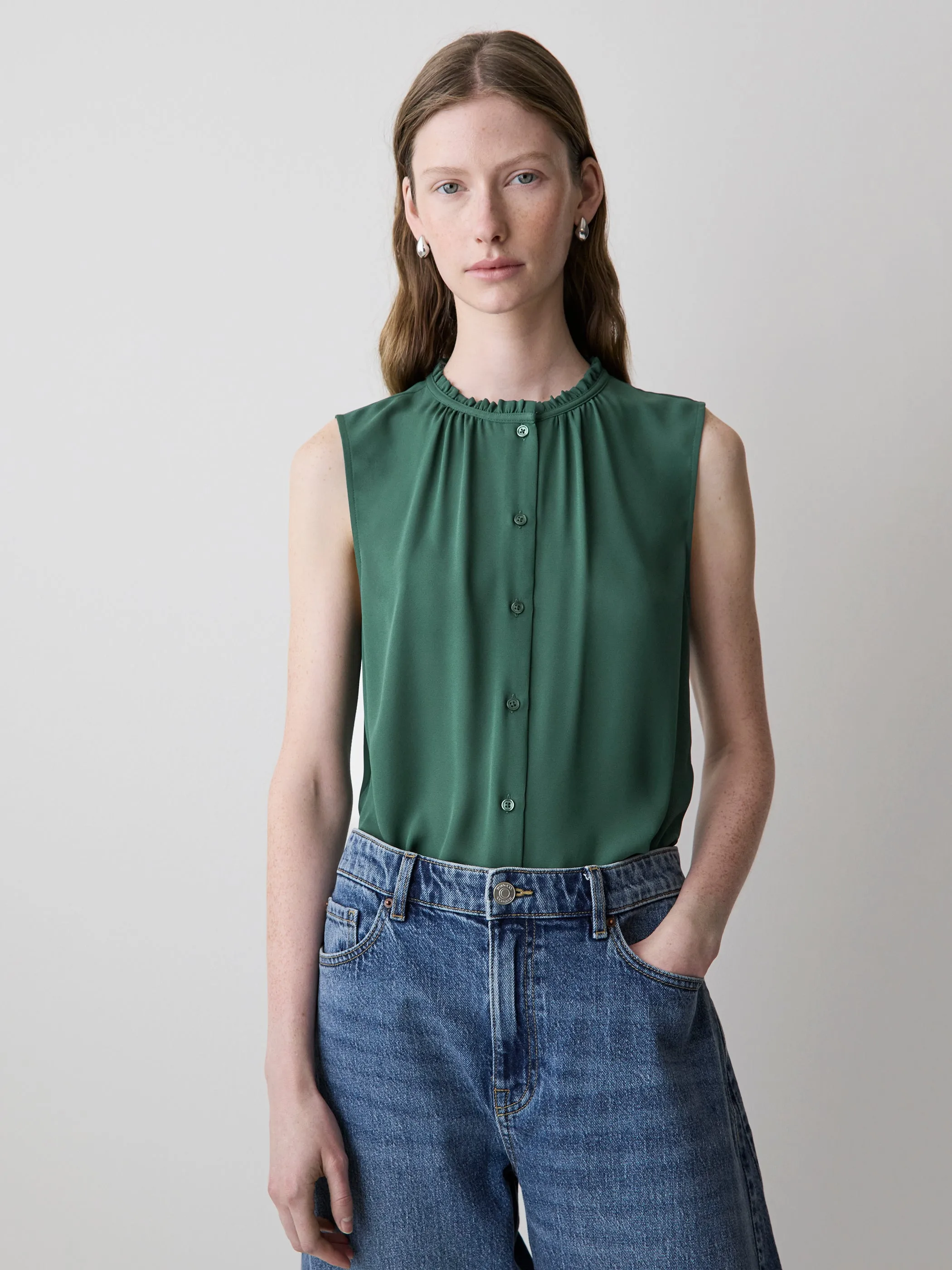 Sleeveless Buttoned-Down Blouse sold by RW&CO.