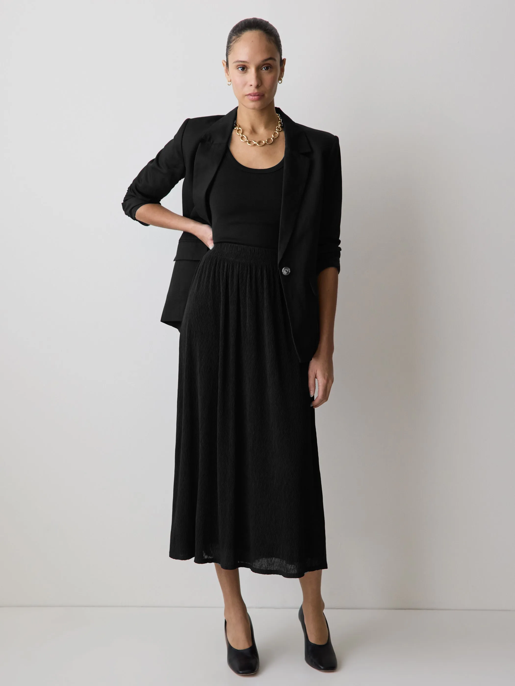 High-Rise Flare Midi Skirt sold by RW&CO.