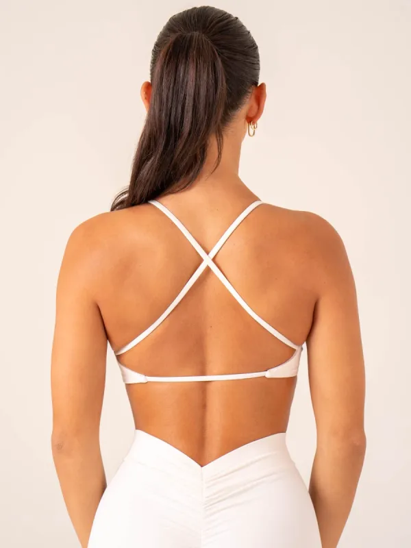 NKD Twist Sports Bra - Off White sold by Ryderwear