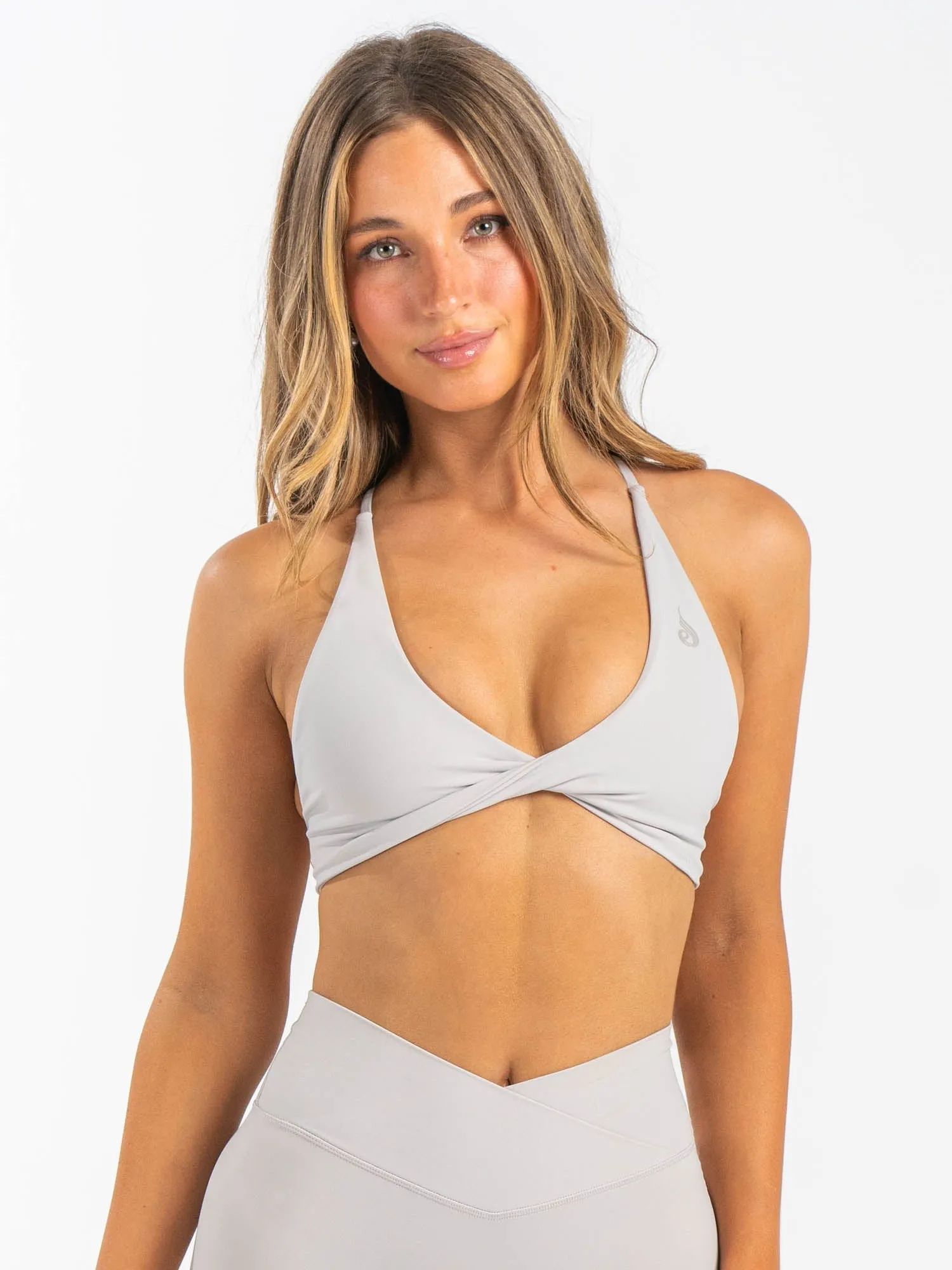 NKD Twist Sports Bra - Sugar Dust sold by Ryderwear