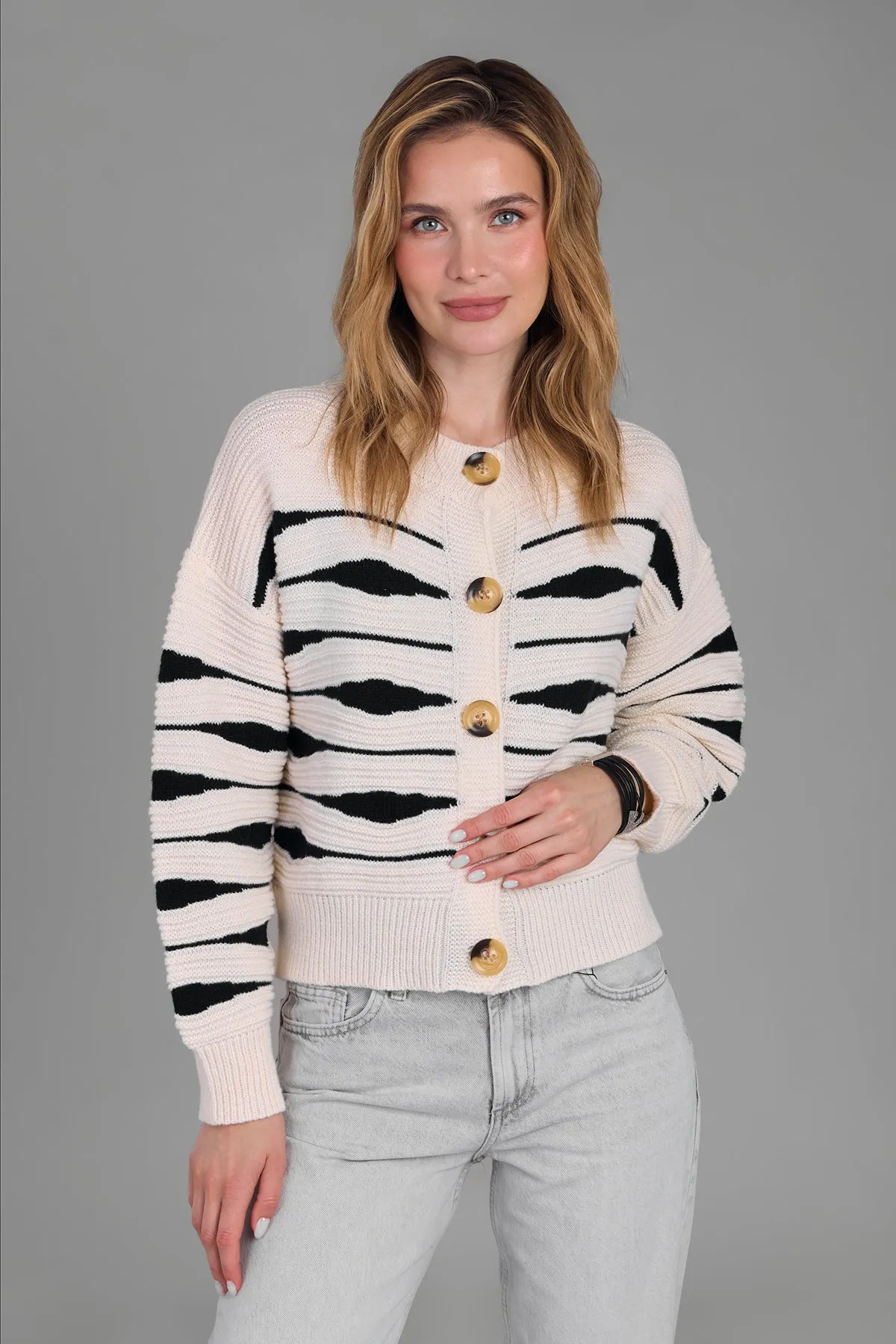 Zebra Buttoned Knit Cardigan sold by SAACHI