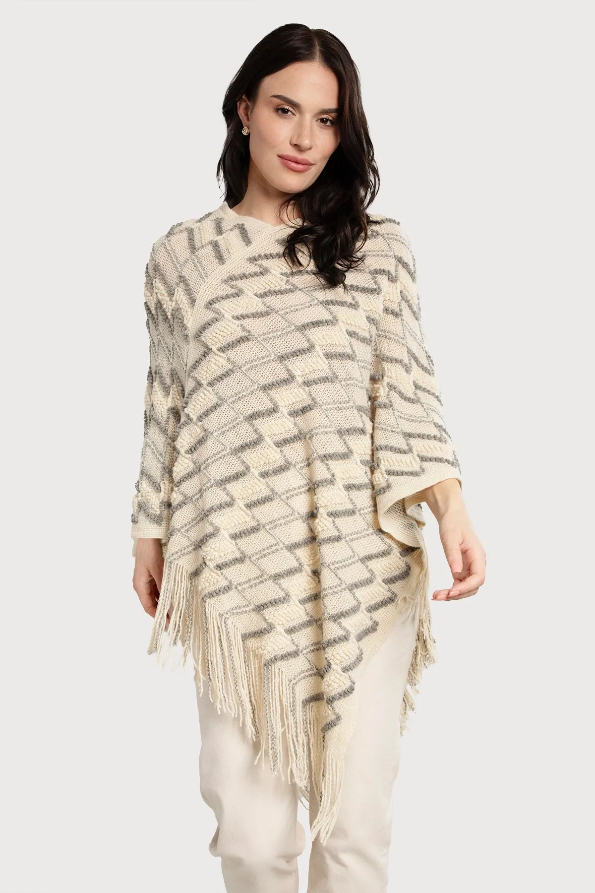 Bohemian Fringe Poncho sold by SAACHI