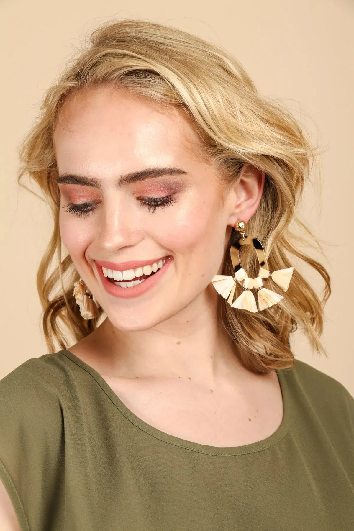 Resin And Multi Tassel Earrings sold by SAACHI product image thumbnail 2