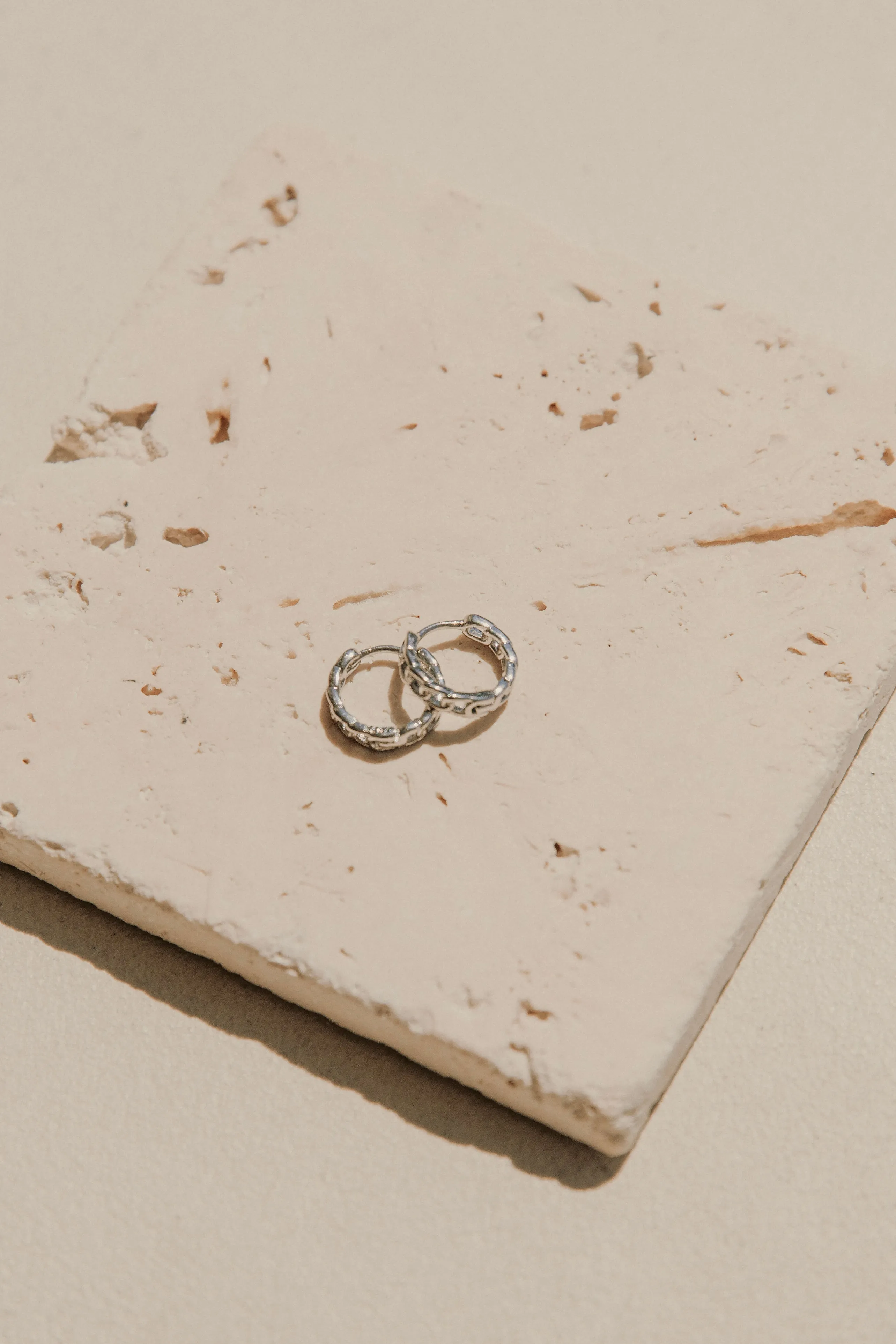 Eve Huggie Earrings - Silver sold by Sabo Skirt