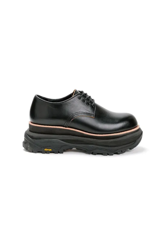 Leather Oxford sold by Sacai