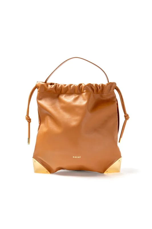 Corner Metal Drawstring sold by Sacai