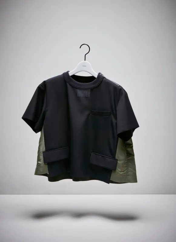 Suiting Pullover sold by Sacai