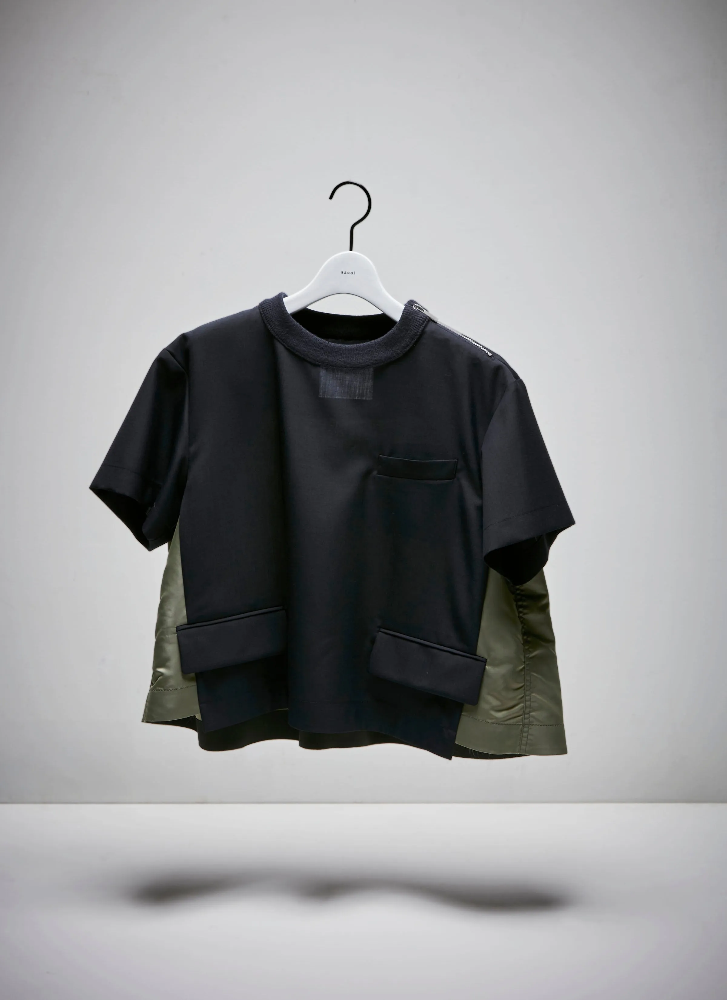 Suiting Pullover sold by Sacai