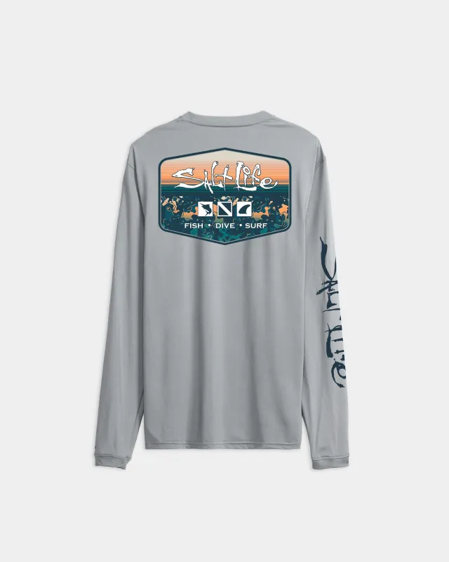Men’s Liquid Depth Badge Long Sleeve SLX Performance Tee made by Salt Life