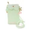 Marron Cream Crossbody Phone Bag (Bon Voyage Series) sold by Sanrio