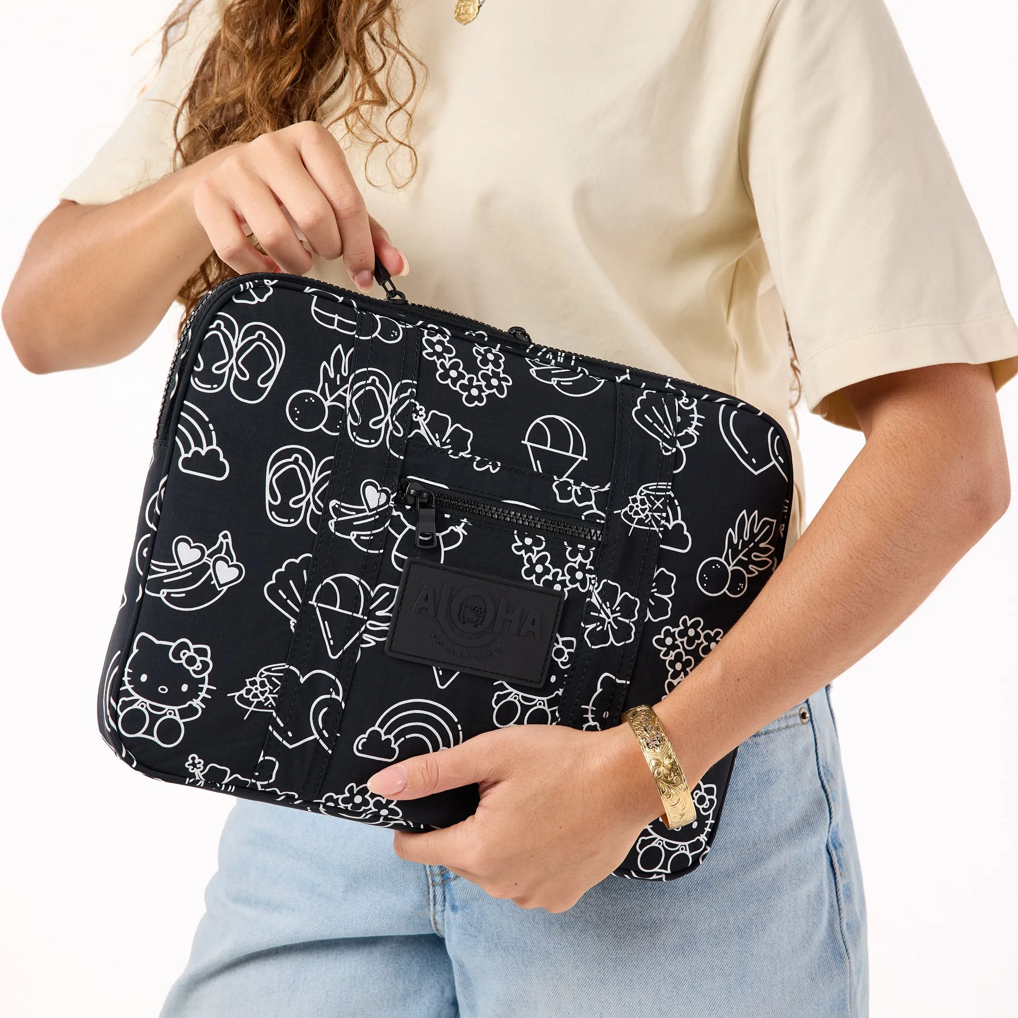 Hello Kitty x Aloha Collection Keep It Light 13" Laptop Case (Black & White Icons) sold by Sanrio