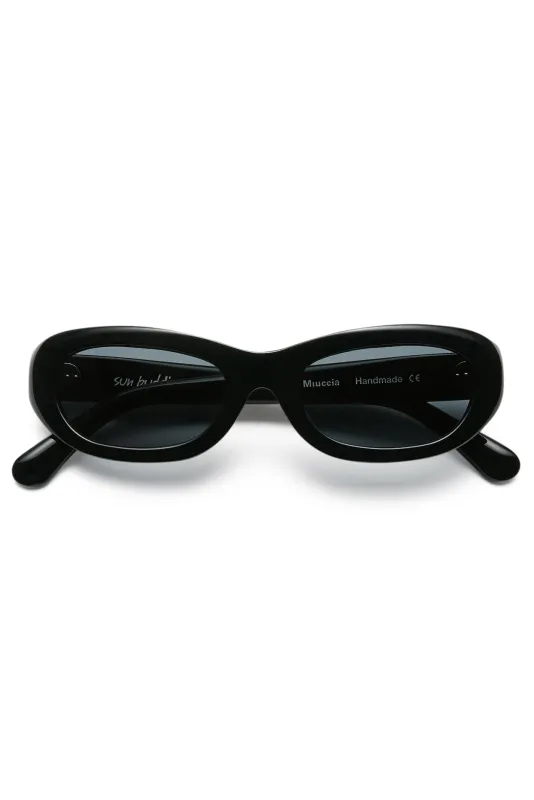 Miuccia sold by Saturdays New York City