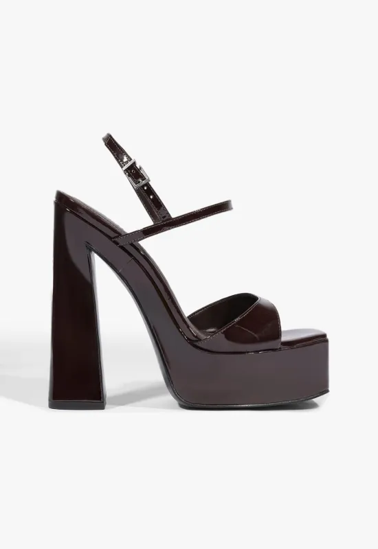 Arlene Patent Sandal sold by SCHUTZ