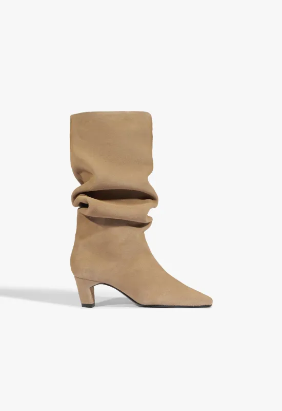 Dellia Slouch Suede Bootie sold by SCHUTZ