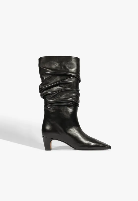 Dellia Slouch Leather Bootie sold by SCHUTZ