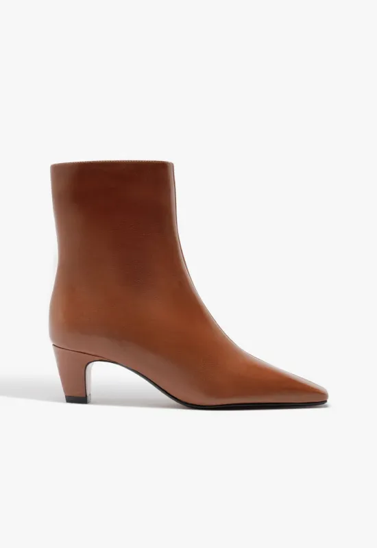 Dellia Casual Leather Bootie sold by SCHUTZ