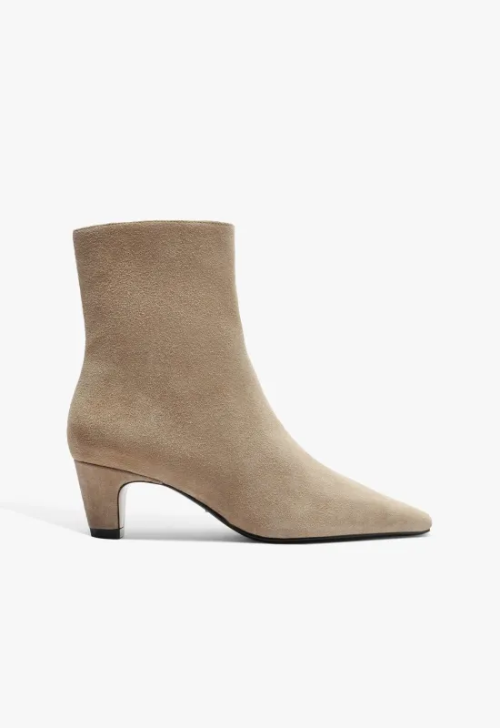 Dellia Suede Bootie sold by SCHUTZ