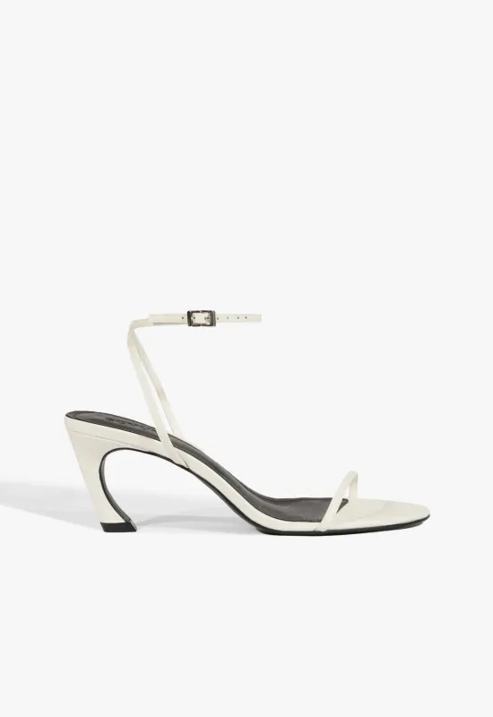 Siena Curve Mid Patent Sandal sold by SCHUTZ