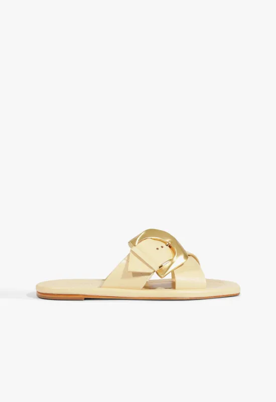 Lois Beige Leather Flat Sandal sold by SCHUTZ