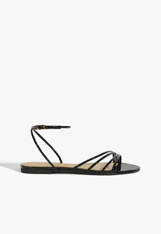 Inez Black Leather Flat Sandal sold by SCHUTZ