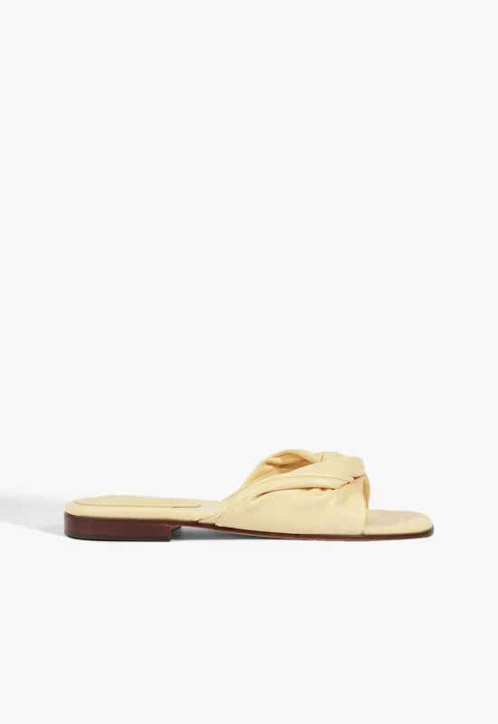Lori Beige Leather Flat Sandal sold by SCHUTZ