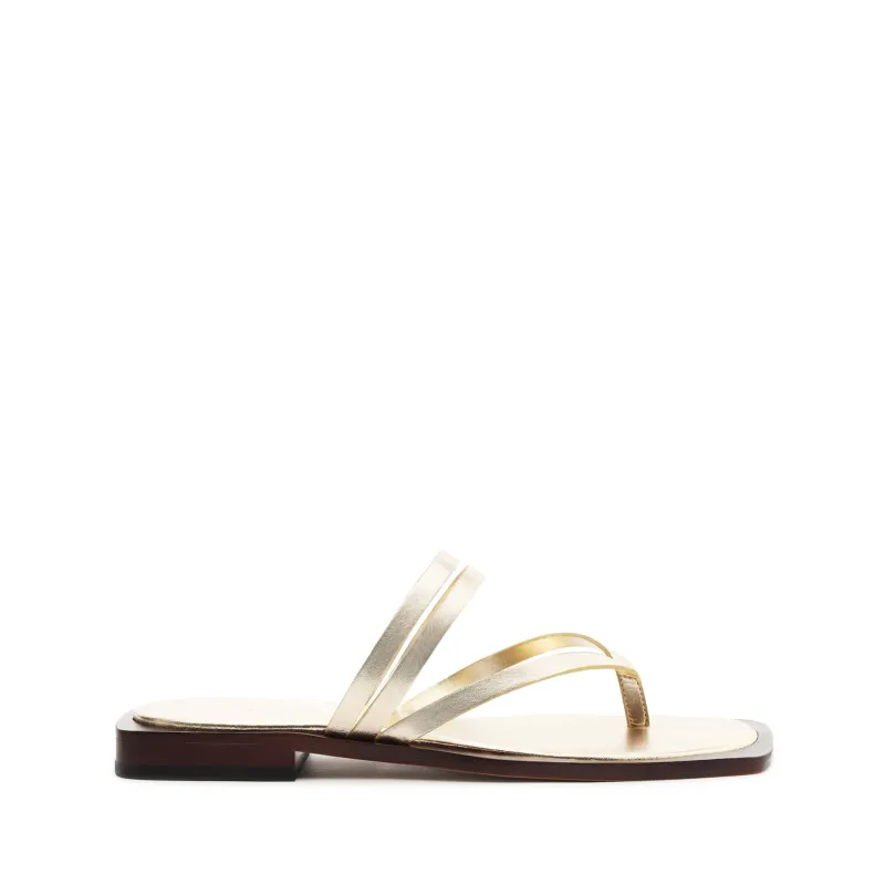 Rania Metallic Leather Flat Sandal sold by SCHUTZ