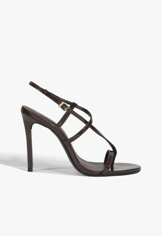 Azure Patent Sandal sold by SCHUTZ