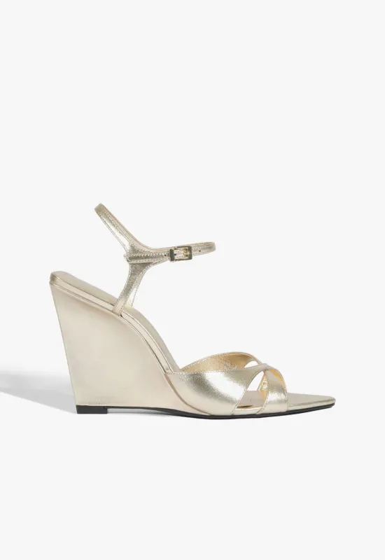 Maxine Metallic Sandal sold by SCHUTZ