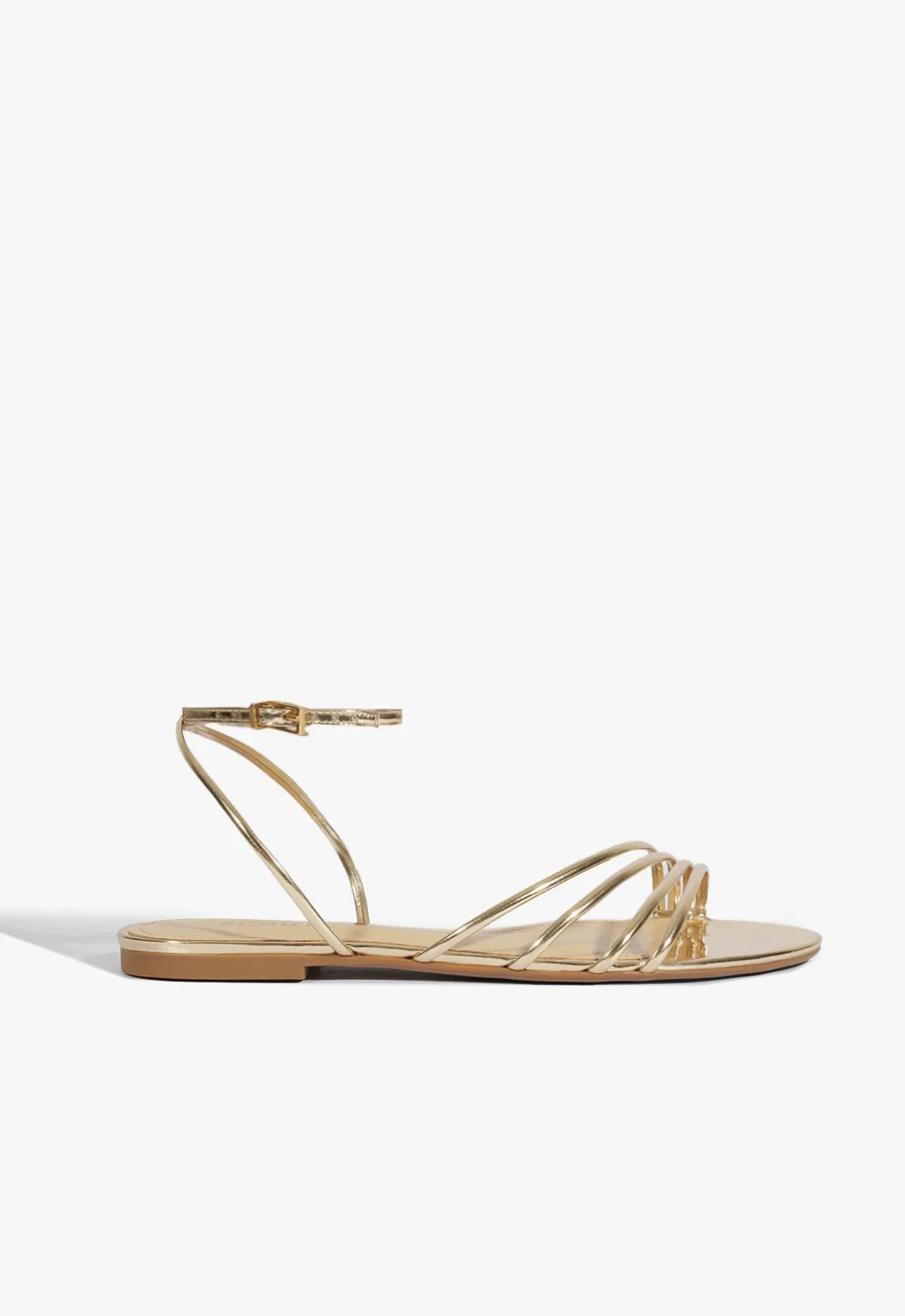 Inez Gold Leather Flat Sandal sold by SCHUTZ