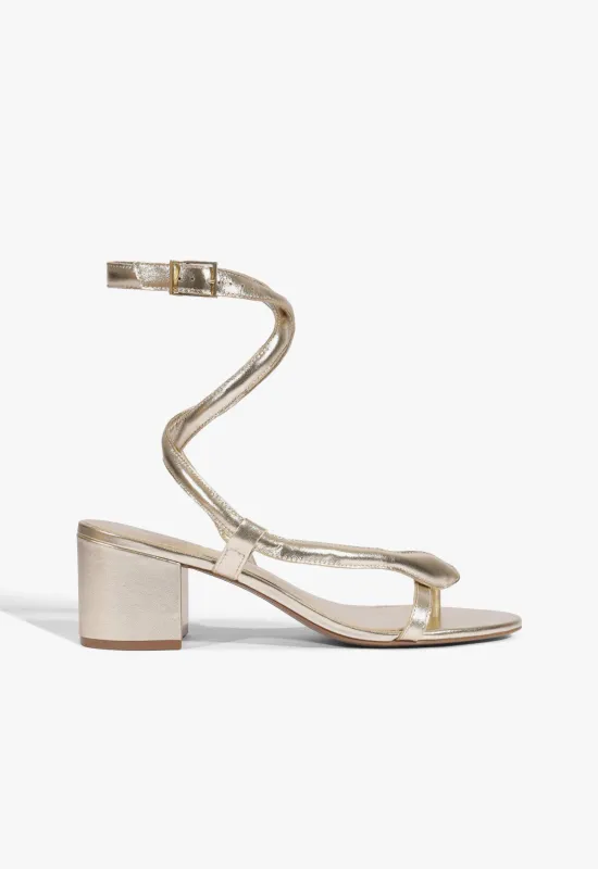 Cleo Metallic Sandal sold by SCHUTZ