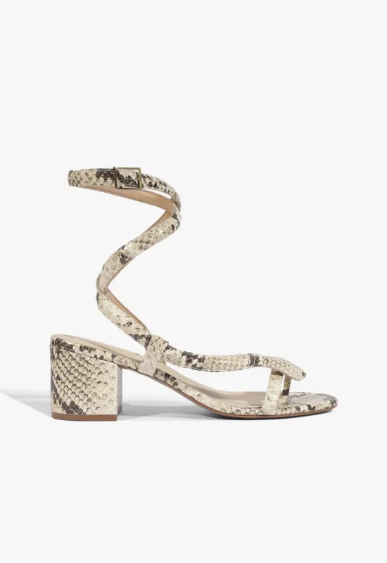 Cleo Snake Print Leather Sandal sold by SCHUTZ