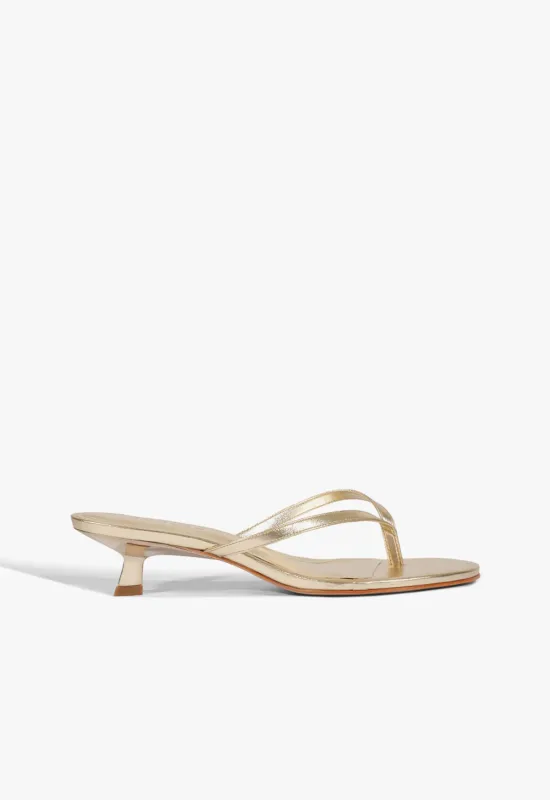 Carolyn Metallic Leather Sandal sold by SCHUTZ