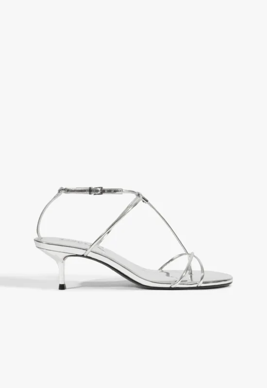 Jules Mid Metallic Leather Sandal sold by SCHUTZ