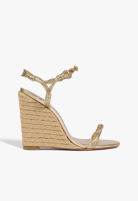 Nara Wedge Leather Sandal sold by SCHUTZ
