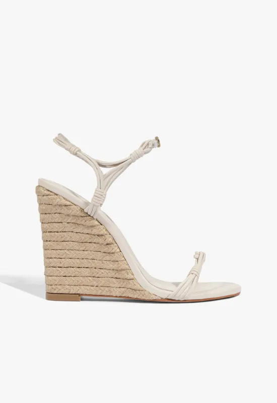 Nara Wedge Leather Sandal sold by SCHUTZ