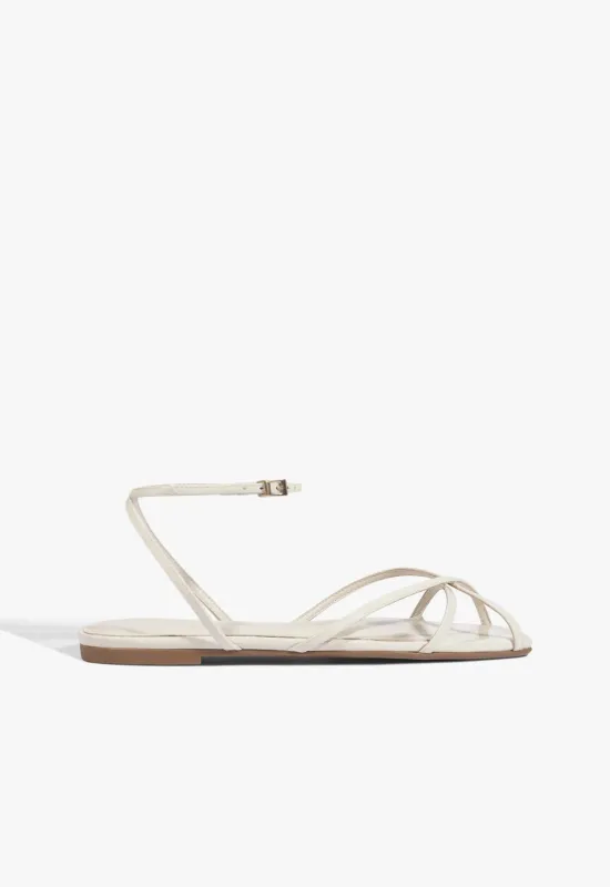 Caeline Buckle Patent Sandal made by SCHUTZ