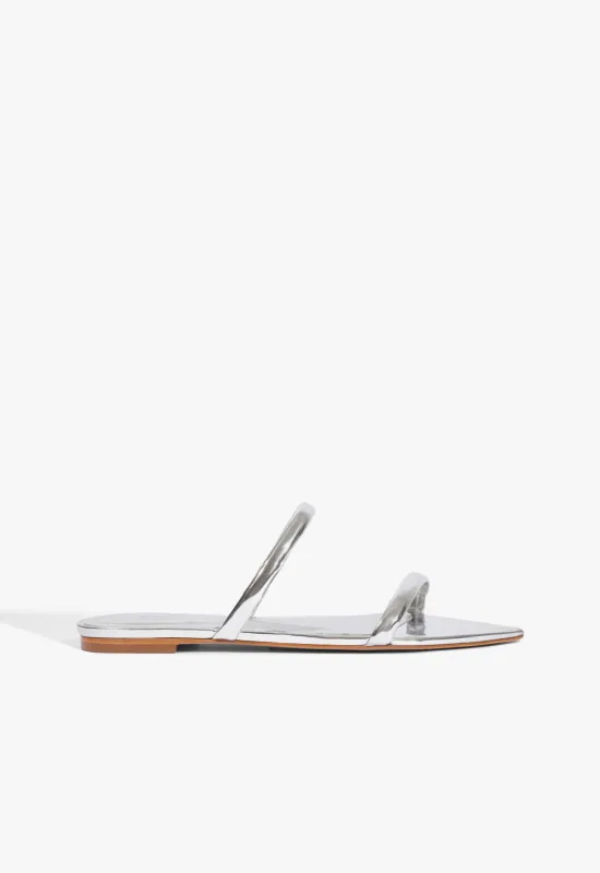Nylle Metallic Flat Sandal sold by SCHUTZ