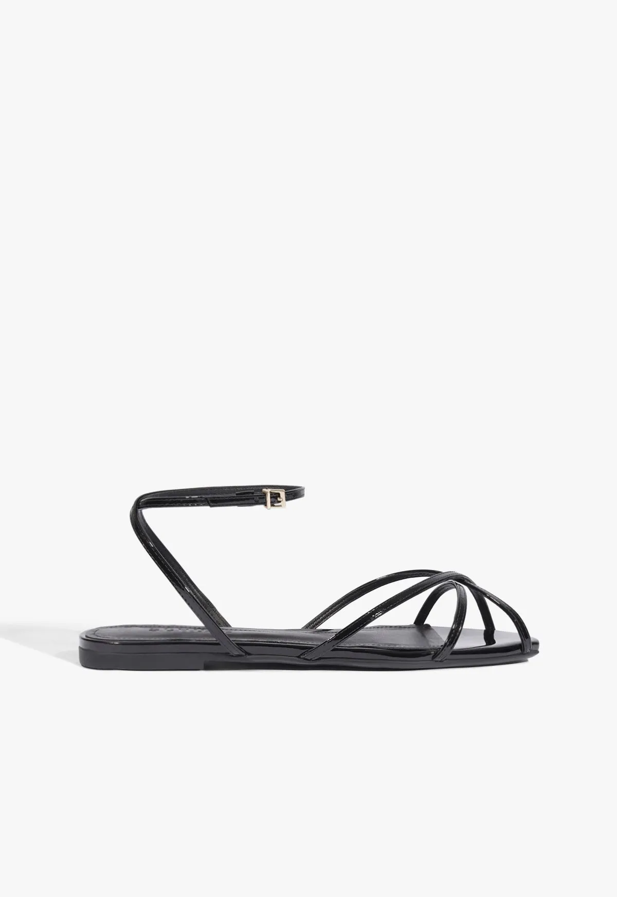 Caeline Buckle Patent Sandal sold by SCHUTZ