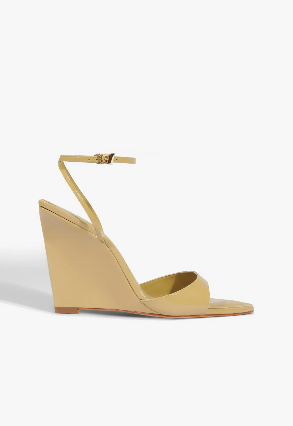 Elodie Wedge Patent Sandal sold by SCHUTZ
