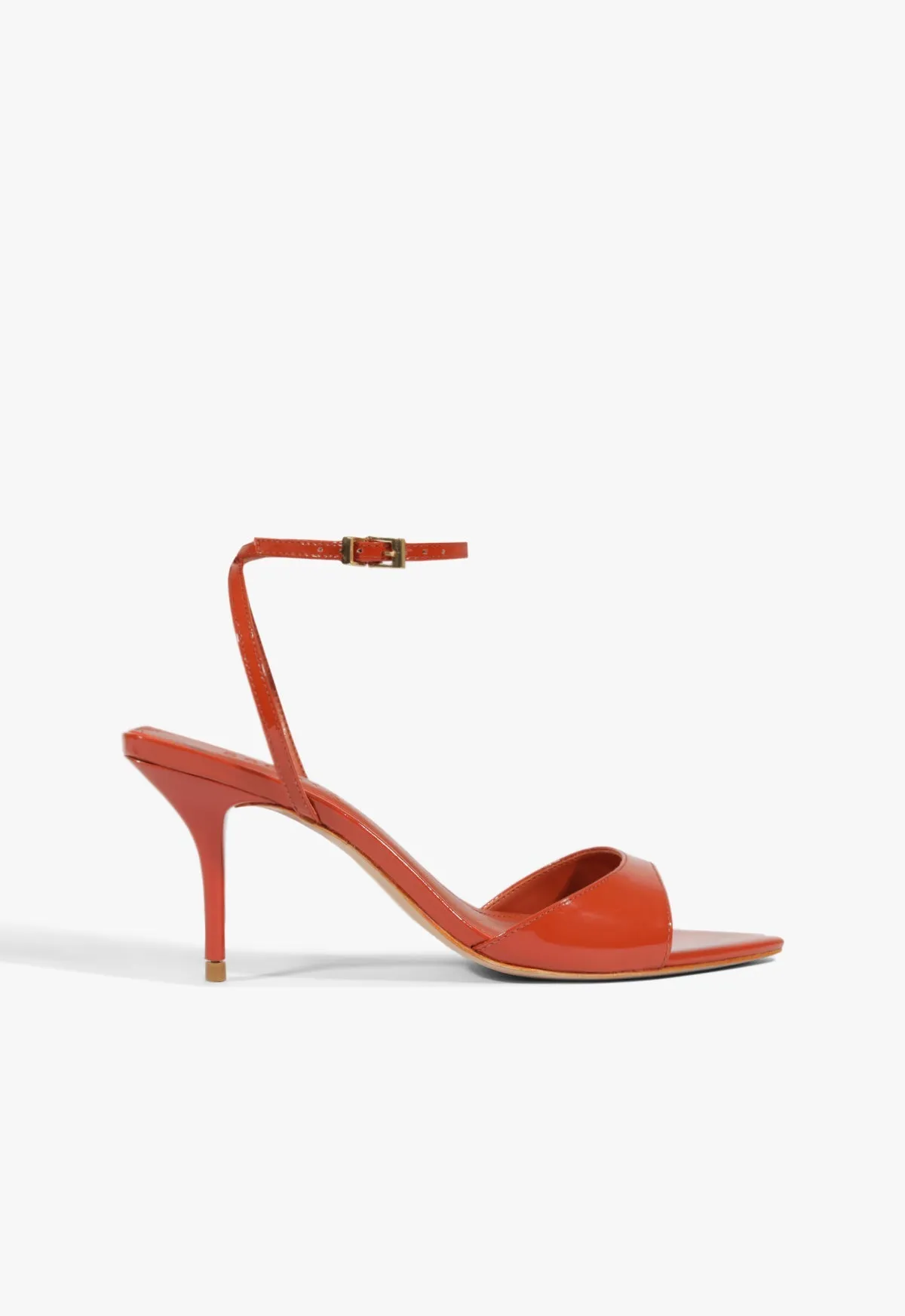 Elodie Buckle Patent Sandal sold by SCHUTZ