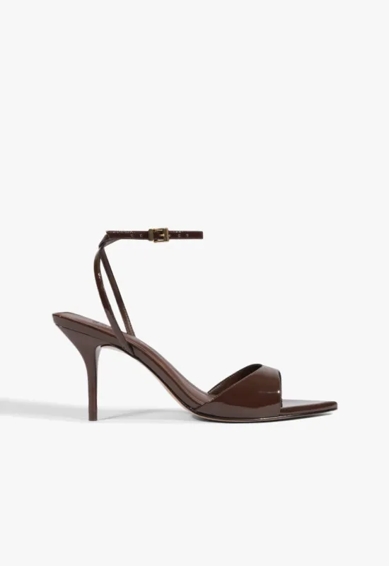 Elodie Buckle Patent Sandal made by SCHUTZ