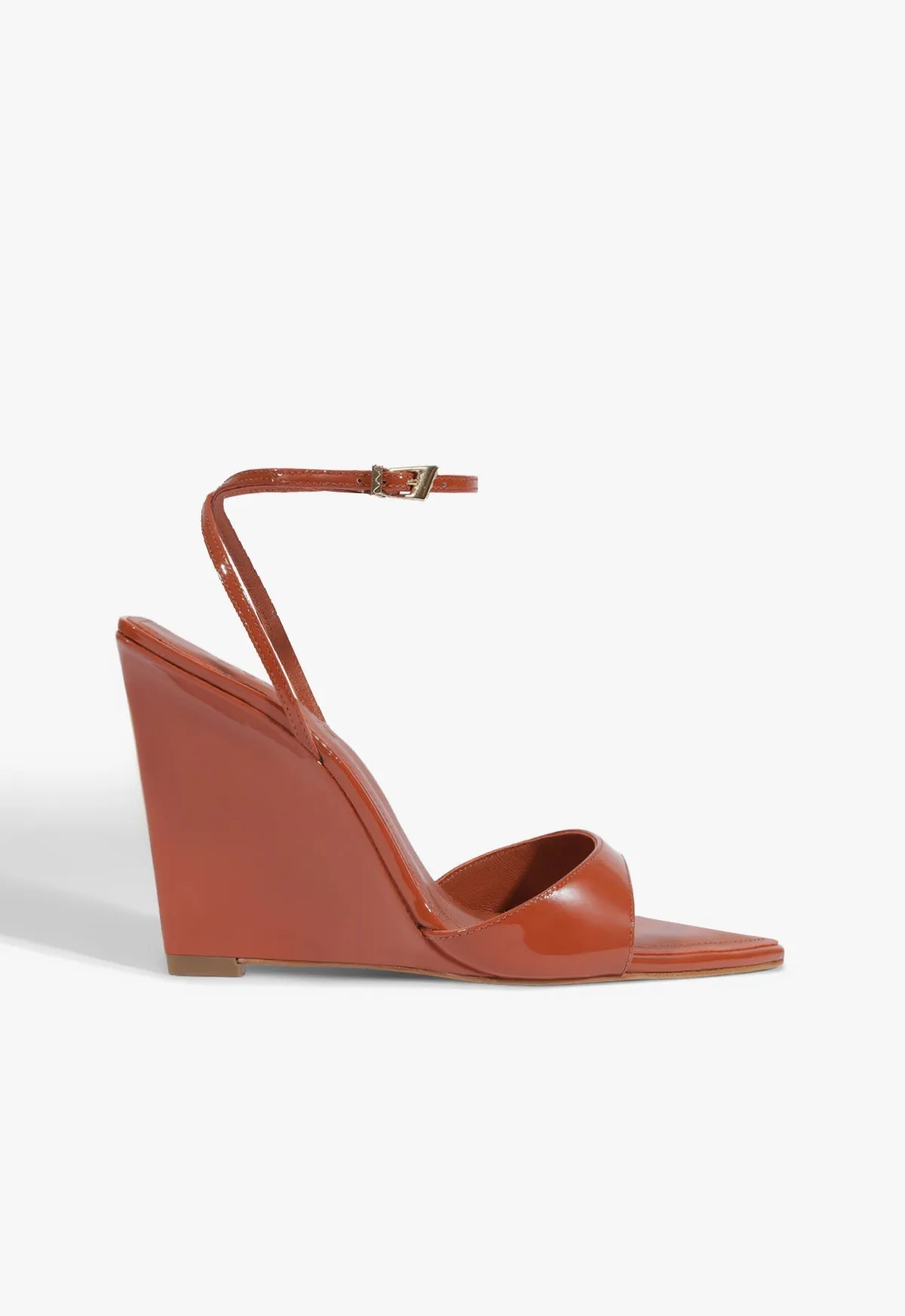 Elodie Wedge Patent Sandal sold by SCHUTZ