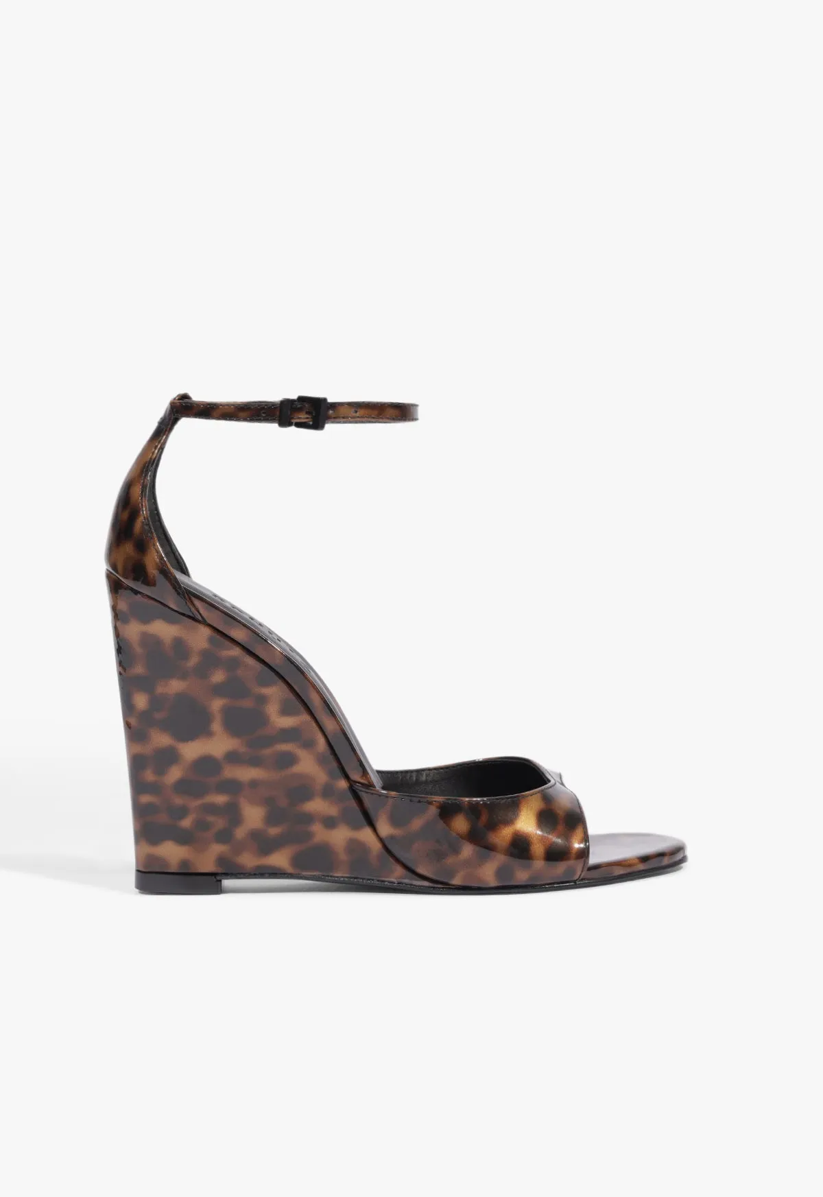 Scarlett Wedge Patent Sandal sold by SCHUTZ