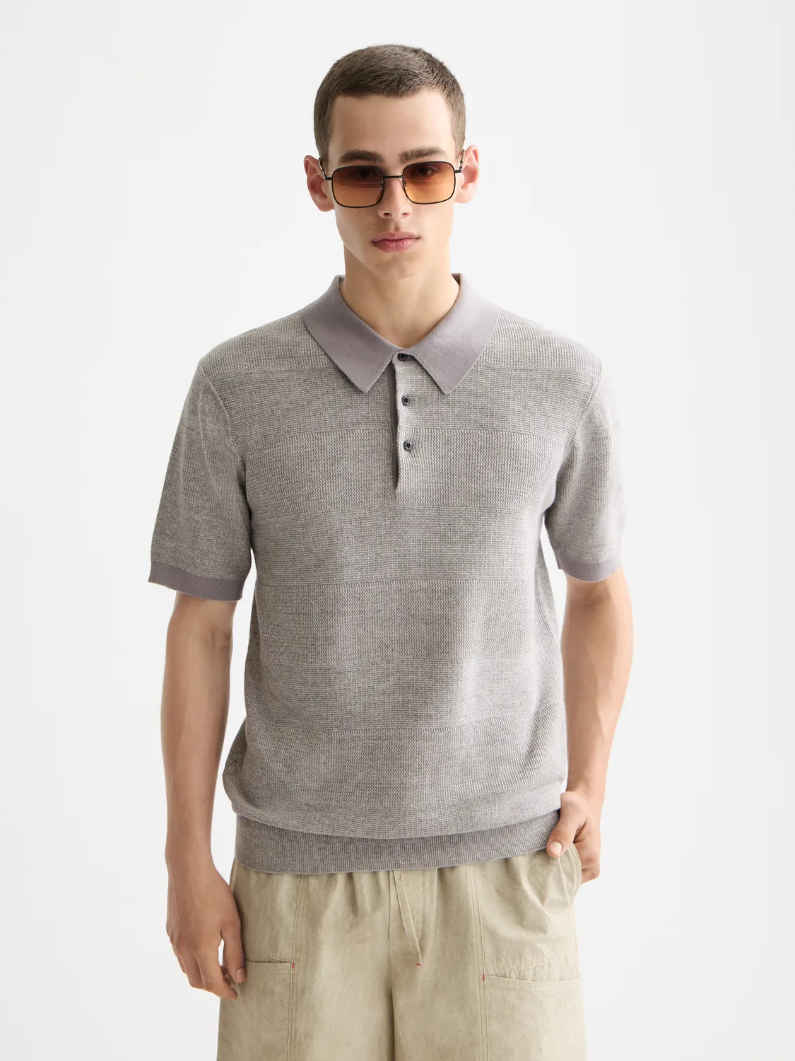 Knitted tonal striped polo sold by Scotch & Soda