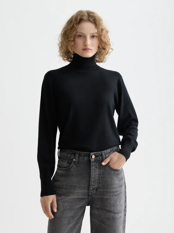 Roll neck relaxed pullover sold by Scotch & Soda