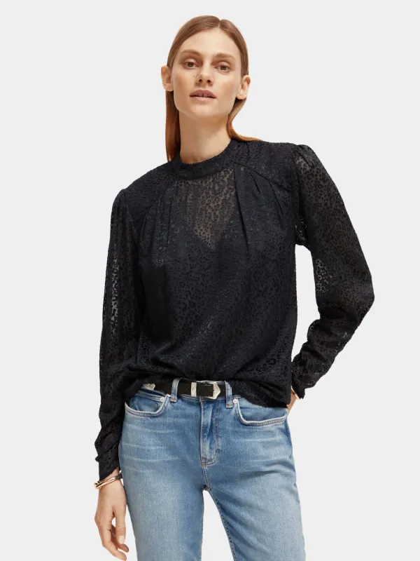 Mock neck open back blouse made by Scotch & Soda