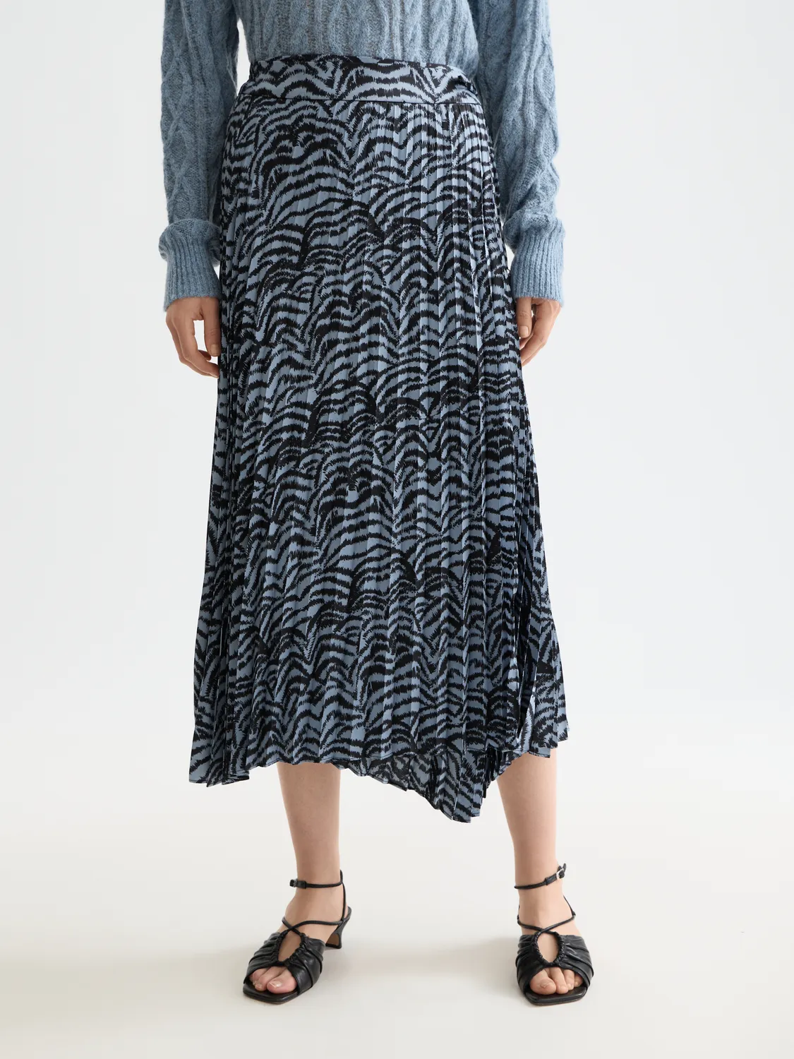 Asymmetrical pleated skirt sold by Scotch & Soda